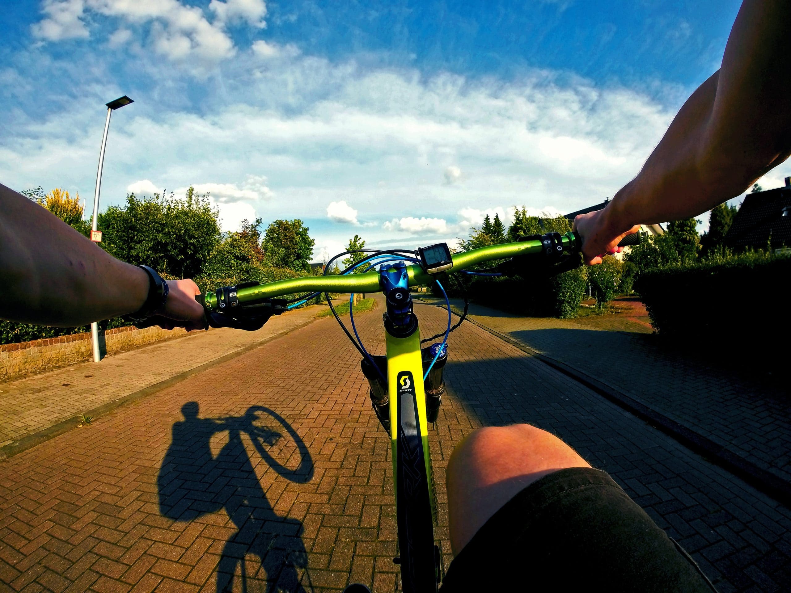 Stiffness of a Carbon Mountain Bike vs. Aluminum: Image of first-person wheelie