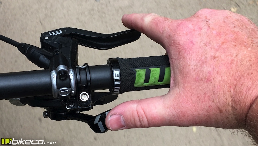 Thumb shifters allow you to hold the brakes while changing gears, similar to twist shifters