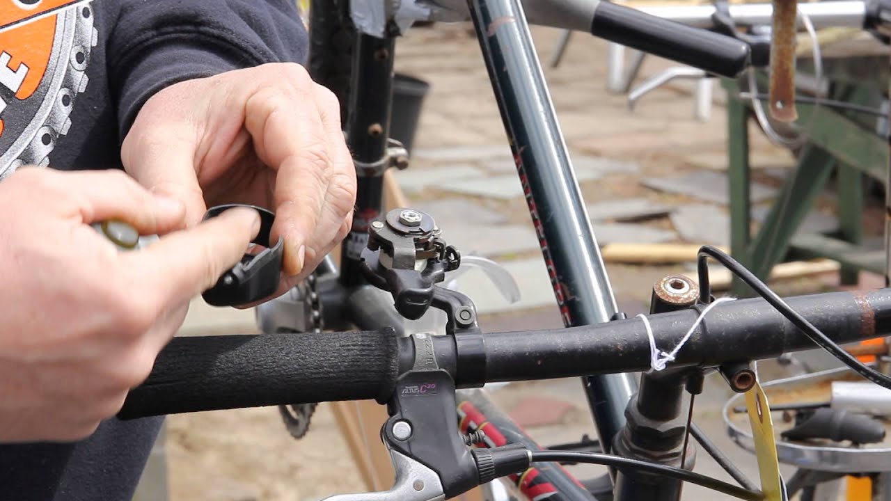 Removing a mountain bike grip shifter.