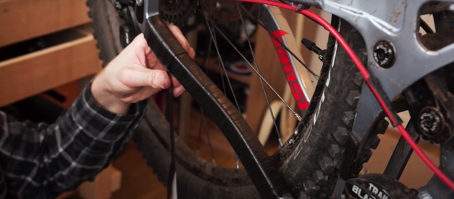 Wrap electrical tape around the chain stay to dampen the noise made by the chain hitting the frame of your mountain bike.