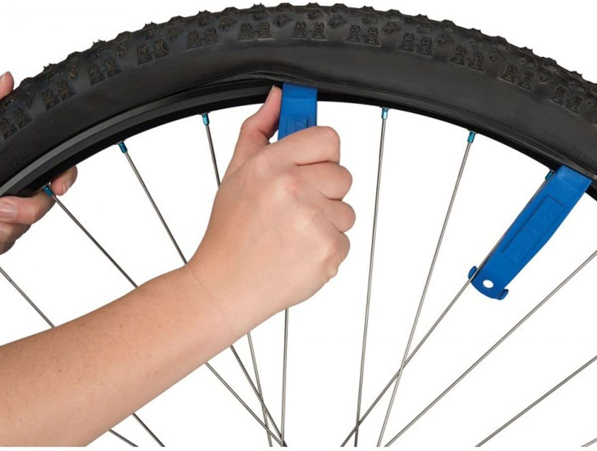 Using tire levers makes changing a mountain bike tire much easier so keep them in your tool kit.