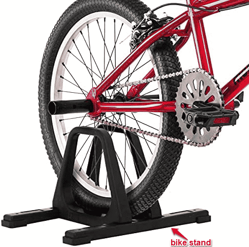 To fix a mountain bike chain that is too loose or too long first stand your bike up using a bike stand.