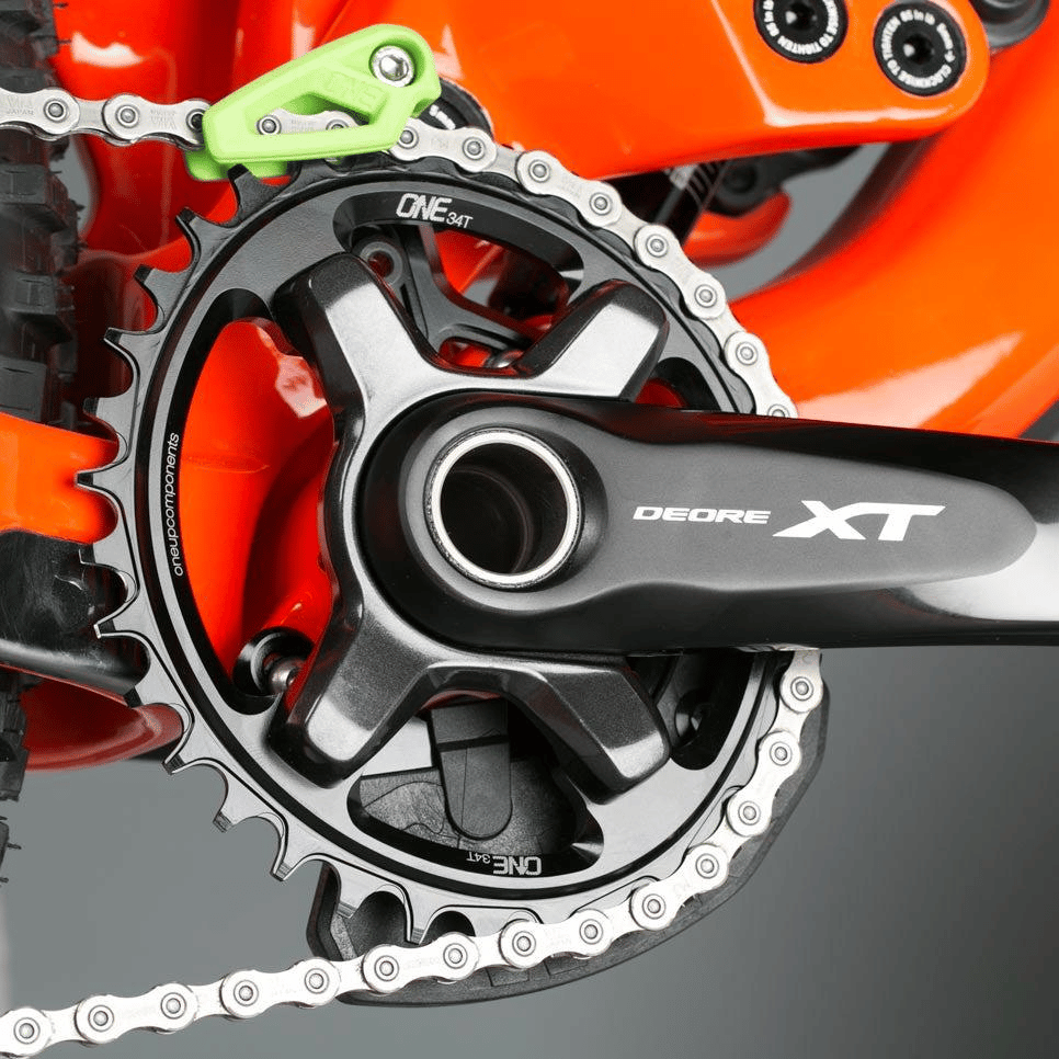 A bash guard doubles up as a chain guide and a protective barrier against impact.