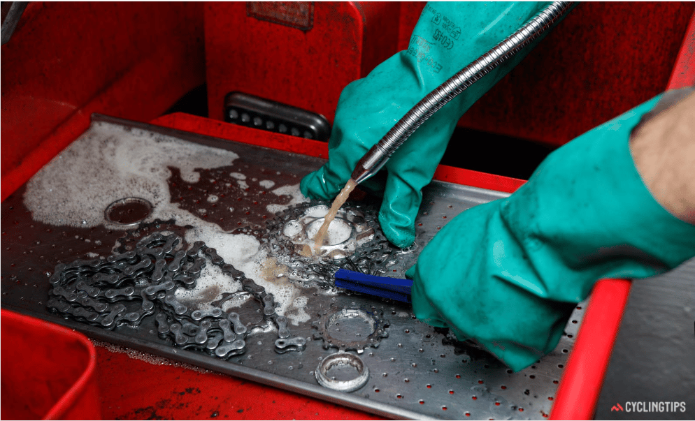 After soaking your mountain bike chain give it a good scrub using a chain cleaning brush.