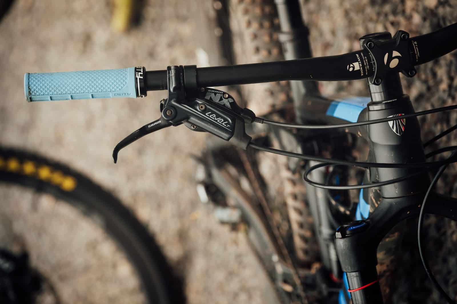 Disconnect cables and levers that are attached to your flat bar before trying to detach it from the bike stem.