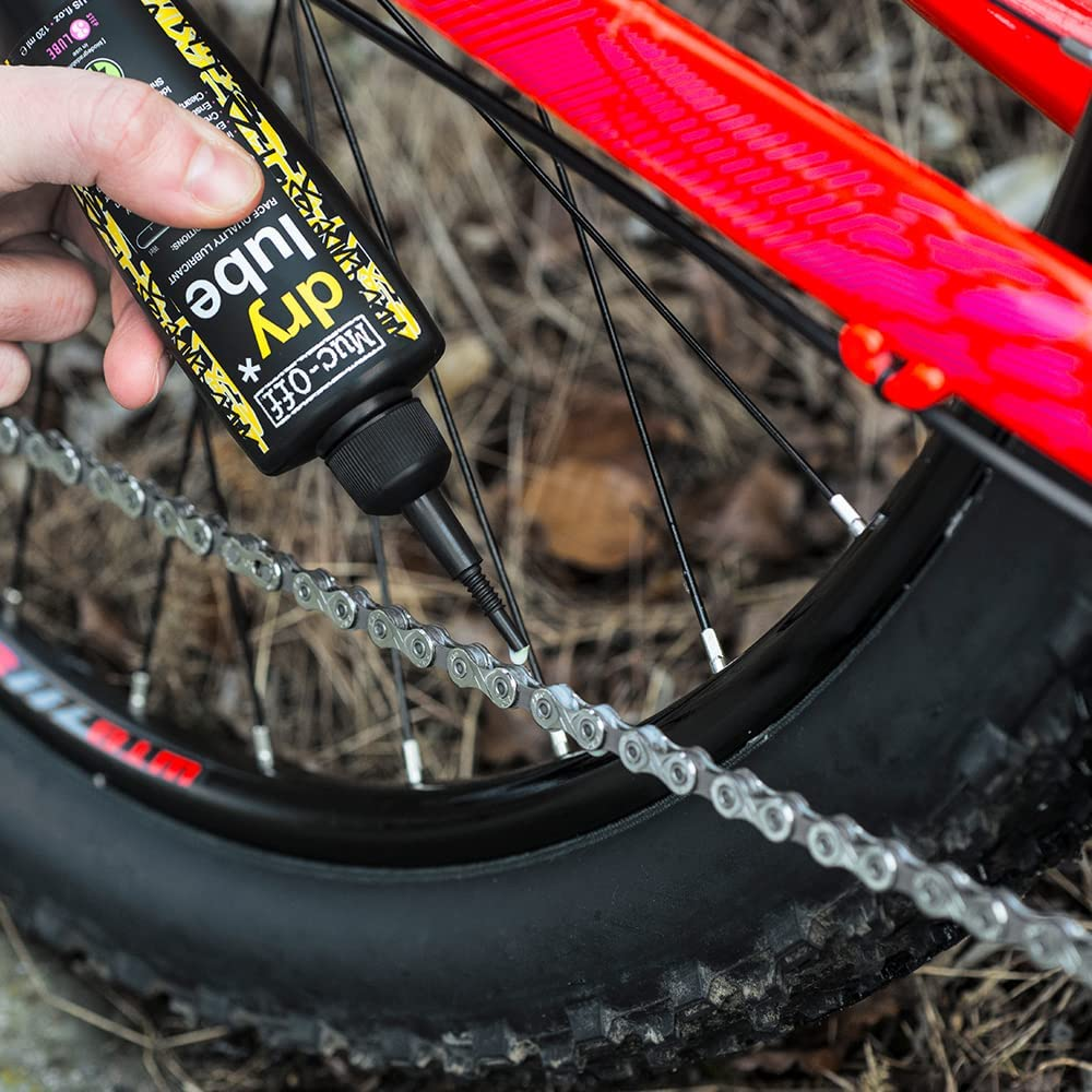 To fix your mountain bike chain that is jumping gears clean it and lubricate it thoroughly.