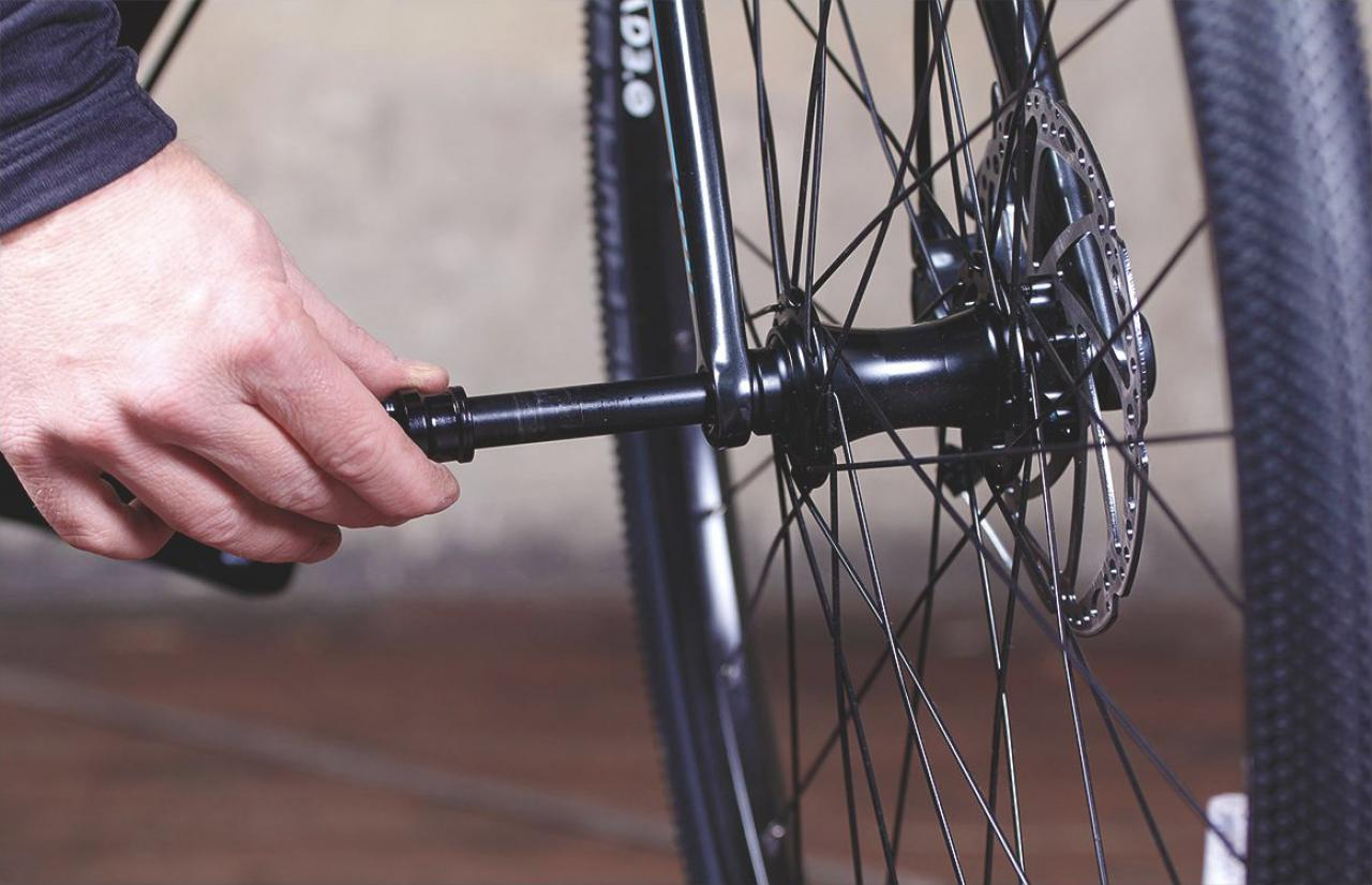 When tightening a mountain bike chain by adjusting the rear wheel make sure that you tighten the thru-axle properly using a torque wrench.