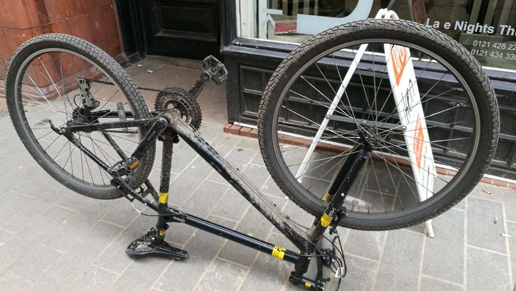 Turning your mountain bike upside down to do maintenance can work just as well as attaching your bike to a bike stand.