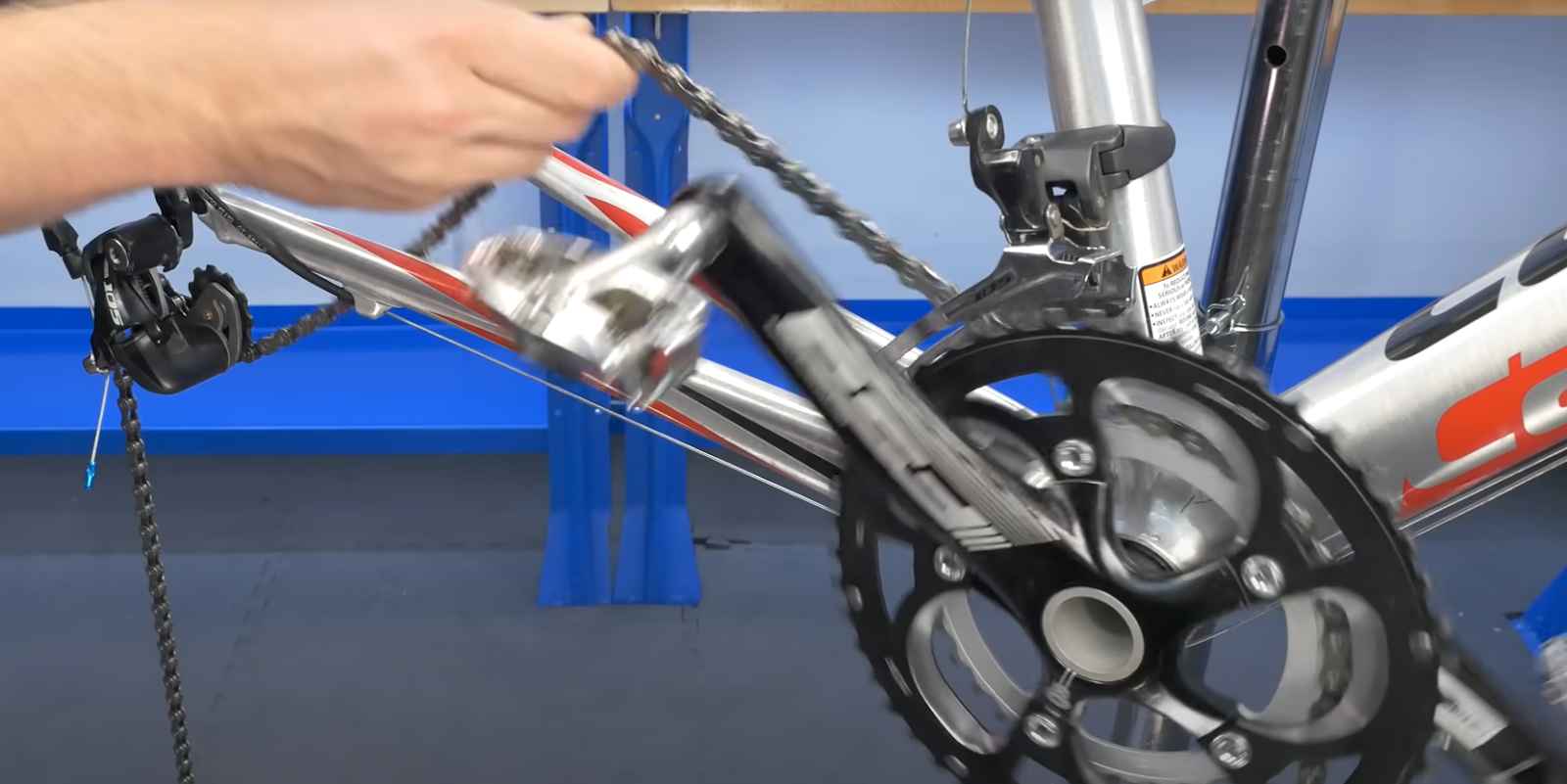 Undo and remove the old chain so that you can use it to size your new chain.