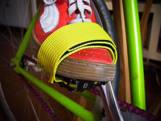 Pedal straps go over the middle of your foot and hold your foot securely onto the pedal.