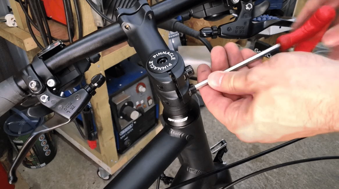 To remove the handlebar you first have to loosen the stem bolts.