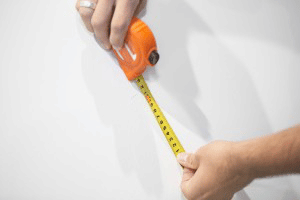 Calculate your inseam length by measuring the distance from the marking on the wall to the floor.