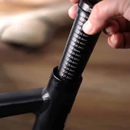 Insert the sizing rod to measure the diameter of the inside of the seat tube.