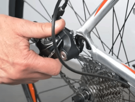 Clear the derailleur of the mountain bike before trying to untangle the chain.