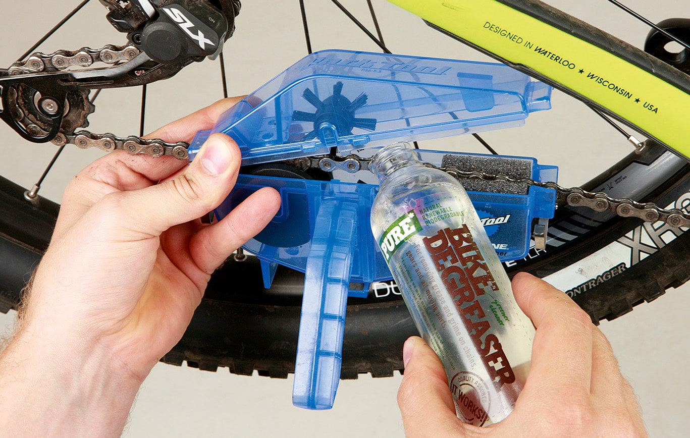 If you are going to wax your mountain bike chain then use a cleaning device to clean with less mess and fuss.