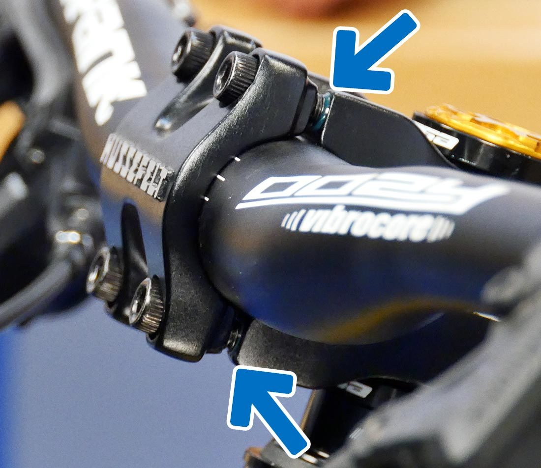 Loosen the handlebar screws and push the handlebar forward to adjust the reach of your mountain bike to be closer to your calculated reach.