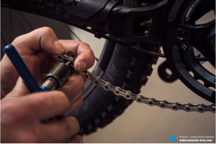 You can easily split the mountain bike chain to shorten or replace it, using a chain tool.