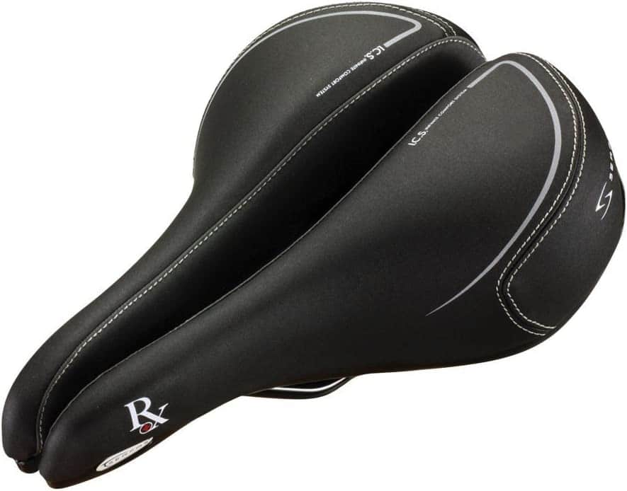 The shorter front and extra cushioning of a mountain bike saddle provide more comfort on rough terrain than a road bike saddle would.